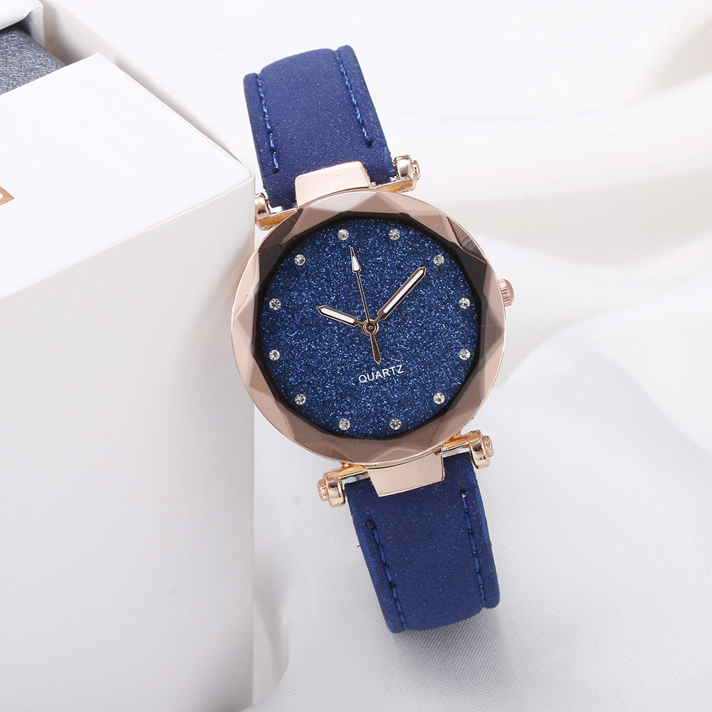 Montre-bracelet romantique pour femmes avec un ciel étoilé en cuir et des strass.