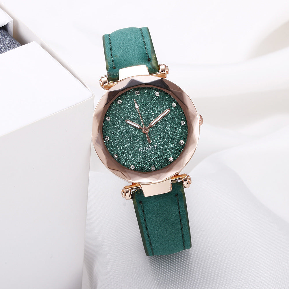 Montre-bracelet romantique pour femmes avec un ciel étoilé en cuir et des strass.