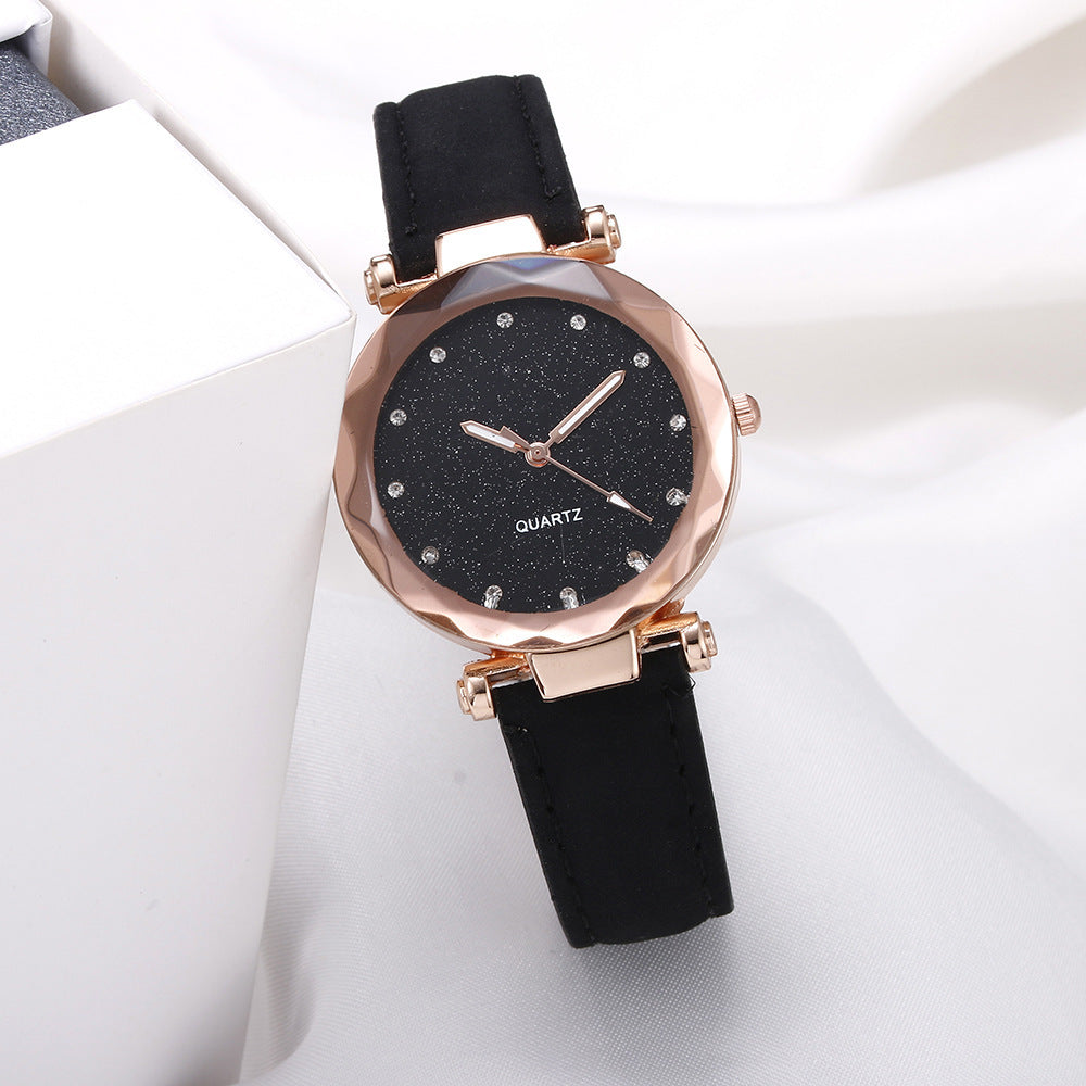 Montre-bracelet romantique pour femmes avec un ciel étoilé en cuir et des strass.