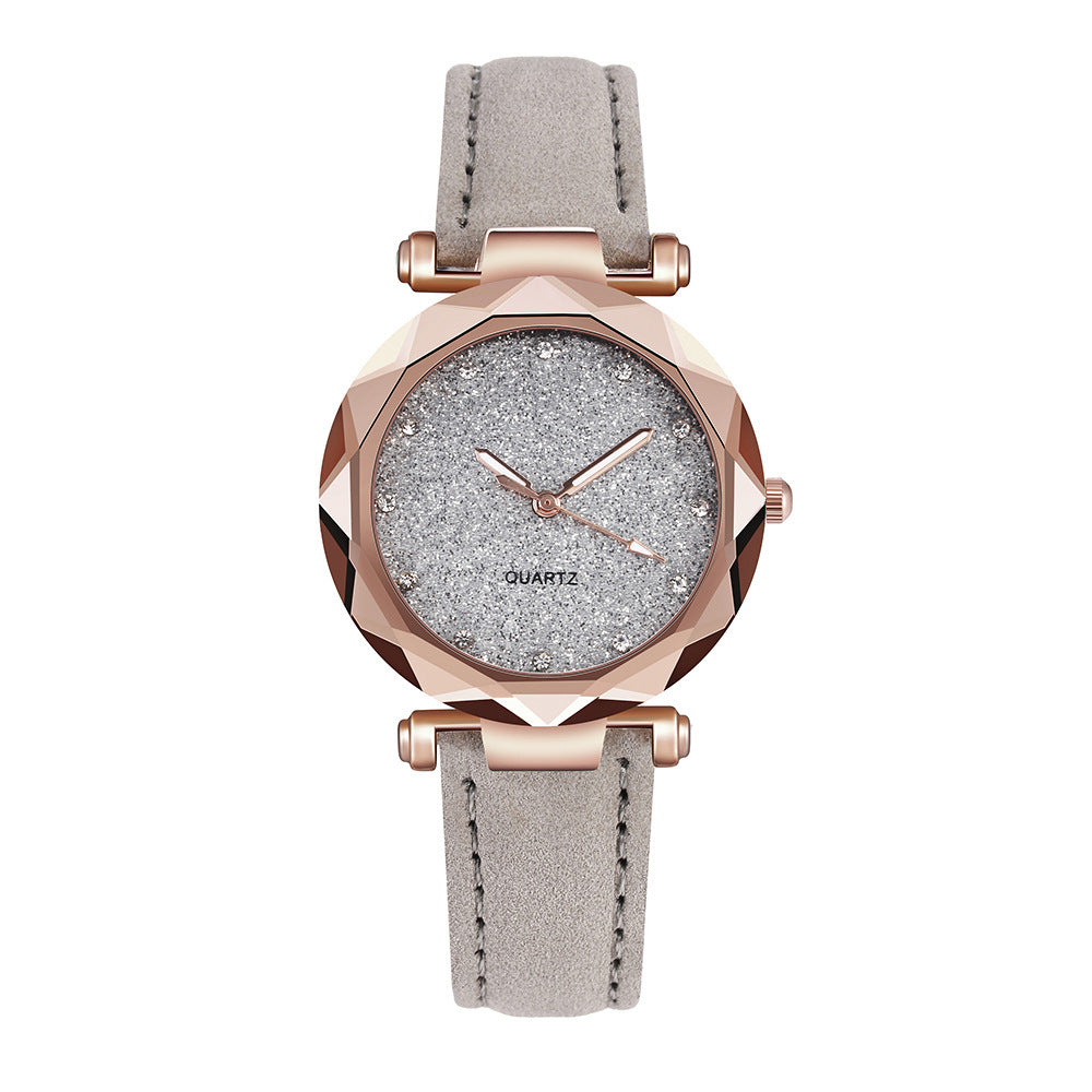 Montre-bracelet romantique pour femmes avec un ciel étoilé en cuir et des strass.