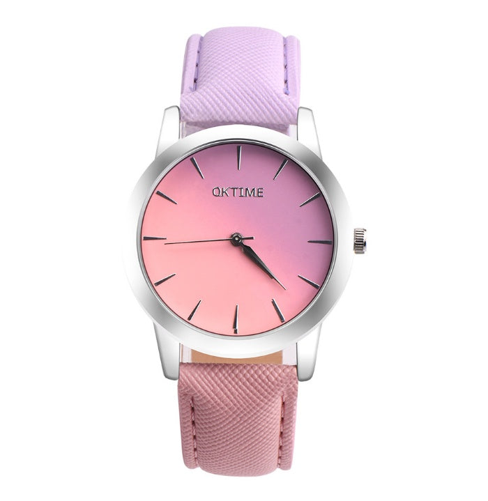 Montre élégante pour femme avec un design rétro décontracté, à cadran arc-en-ciel, mouvement à quartz.