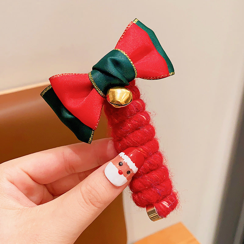 Bande élastique mignonne pour les cheveux des enfants à Noël, accessoire capillaire festif en spirale.