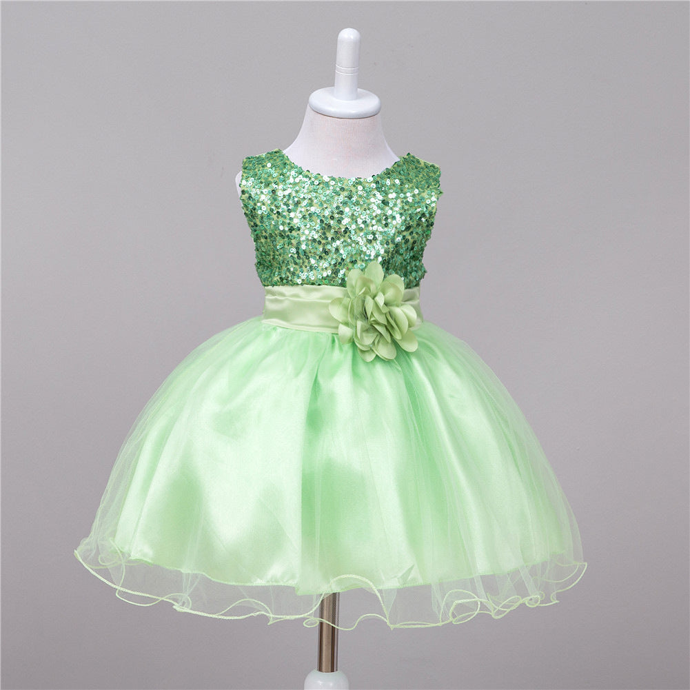 Robe de princesse à paillettes pour bébé fille pour un mariage.