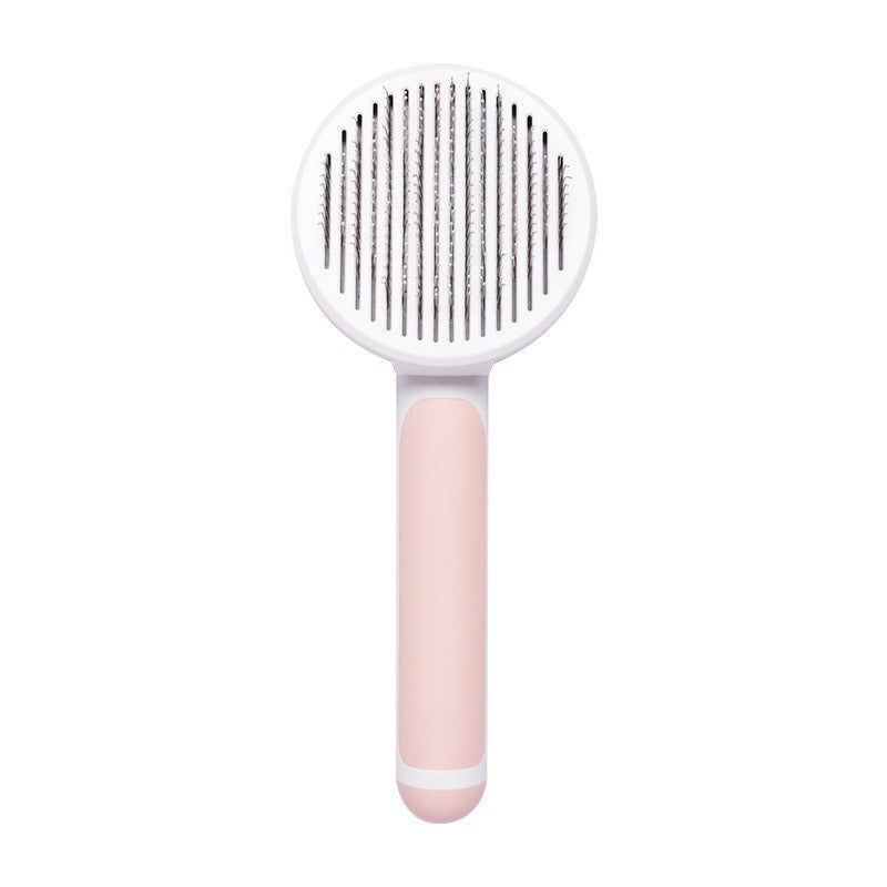 Nouvelle brosse pour chat domestique très demandée, peigne en acier à main avec système d'auto-nettoyage pour enlever les poils.