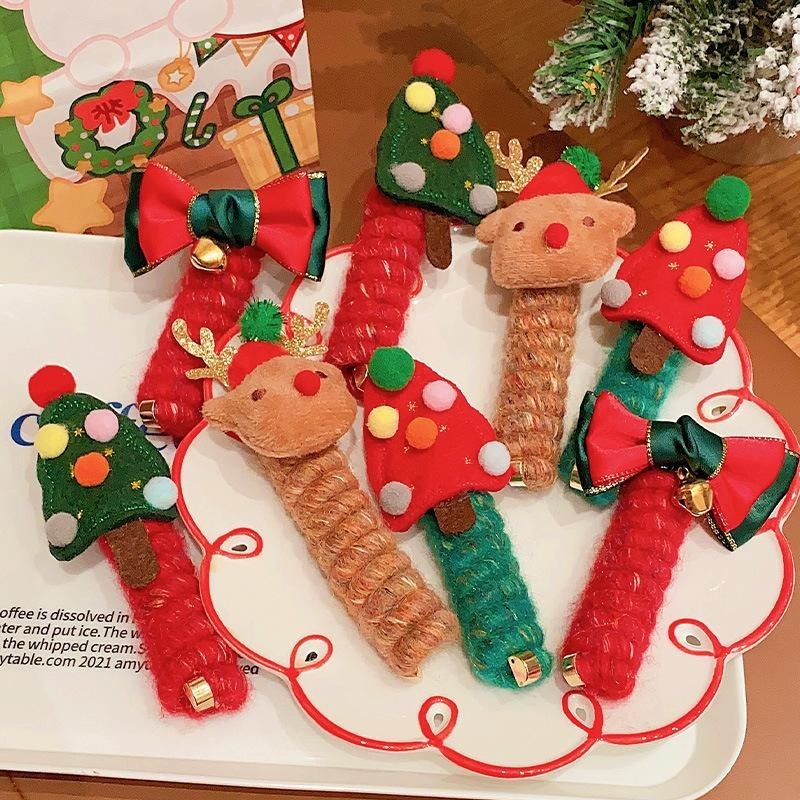 Bande élastique mignonne pour les cheveux des enfants à Noël, accessoire capillaire festif en spirale.