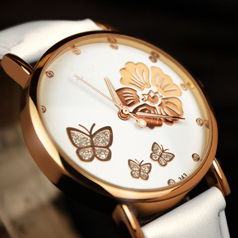 Montres pour dames avec ceinture en strass.