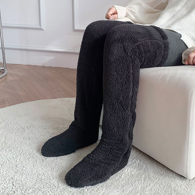 Chaussettes longues et chaudes en laine pour l'hiver, qui montent au-dessus du genou et protègent du froid au niveau des jambes et des genoux. Chaussettes idéales pour rester au chaud à la maison.