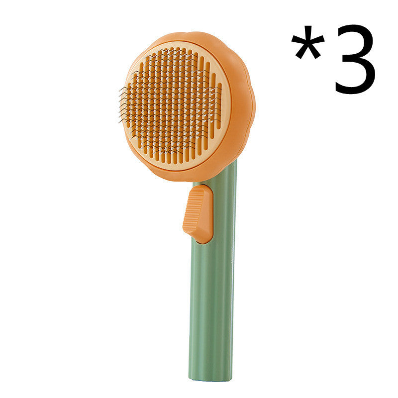 Nouvelle brosse pour chat domestique très demandée, peigne en acier à main avec système d'auto-nettoyage pour enlever les poils.