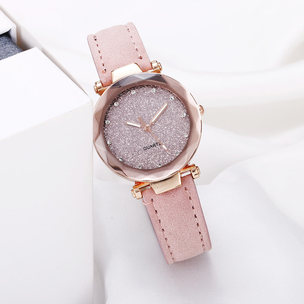 Montre-bracelet romantique pour femmes avec un ciel étoilé en cuir et des strass.