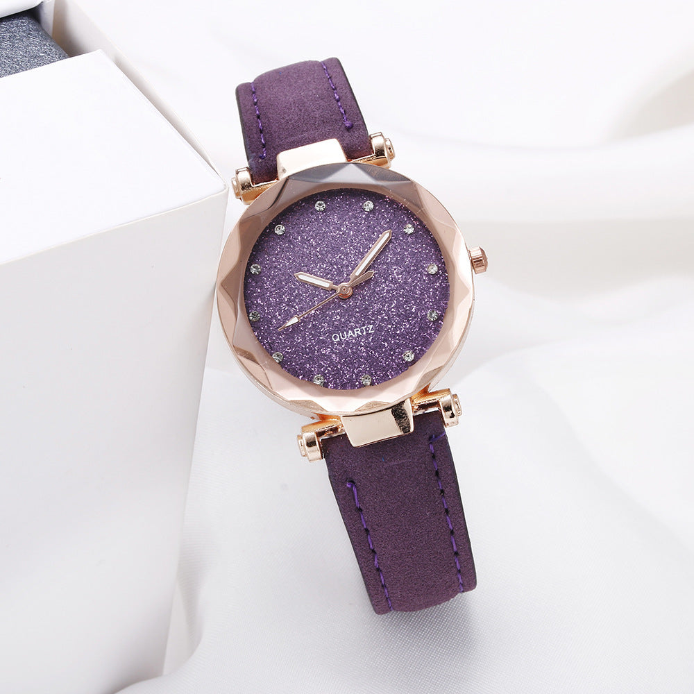 Montre-bracelet romantique pour femmes avec un ciel étoilé en cuir et des strass.