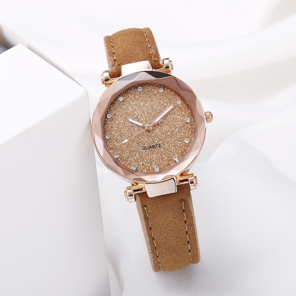 Montre-bracelet romantique pour femmes avec un ciel étoilé en cuir et des strass.