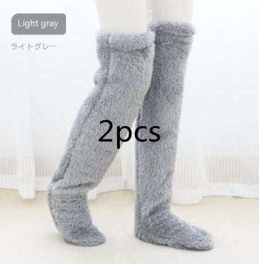 Chaussettes longues et chaudes en laine pour l'hiver, qui montent au-dessus du genou et protègent du froid au niveau des jambes et des genoux. Chaussettes idéales pour rester au chaud à la maison.