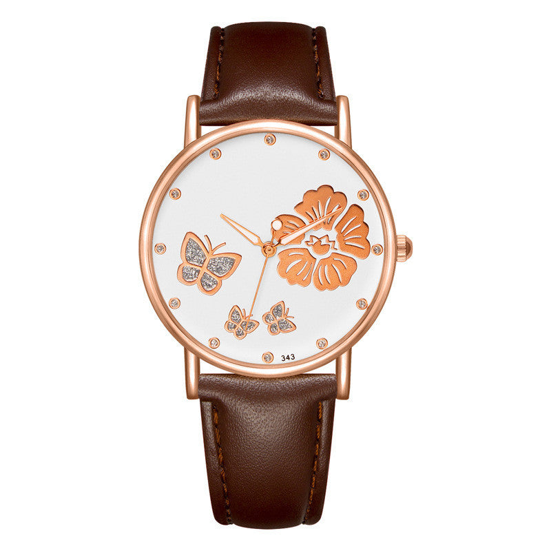 Montres pour dames avec ceinture en strass.