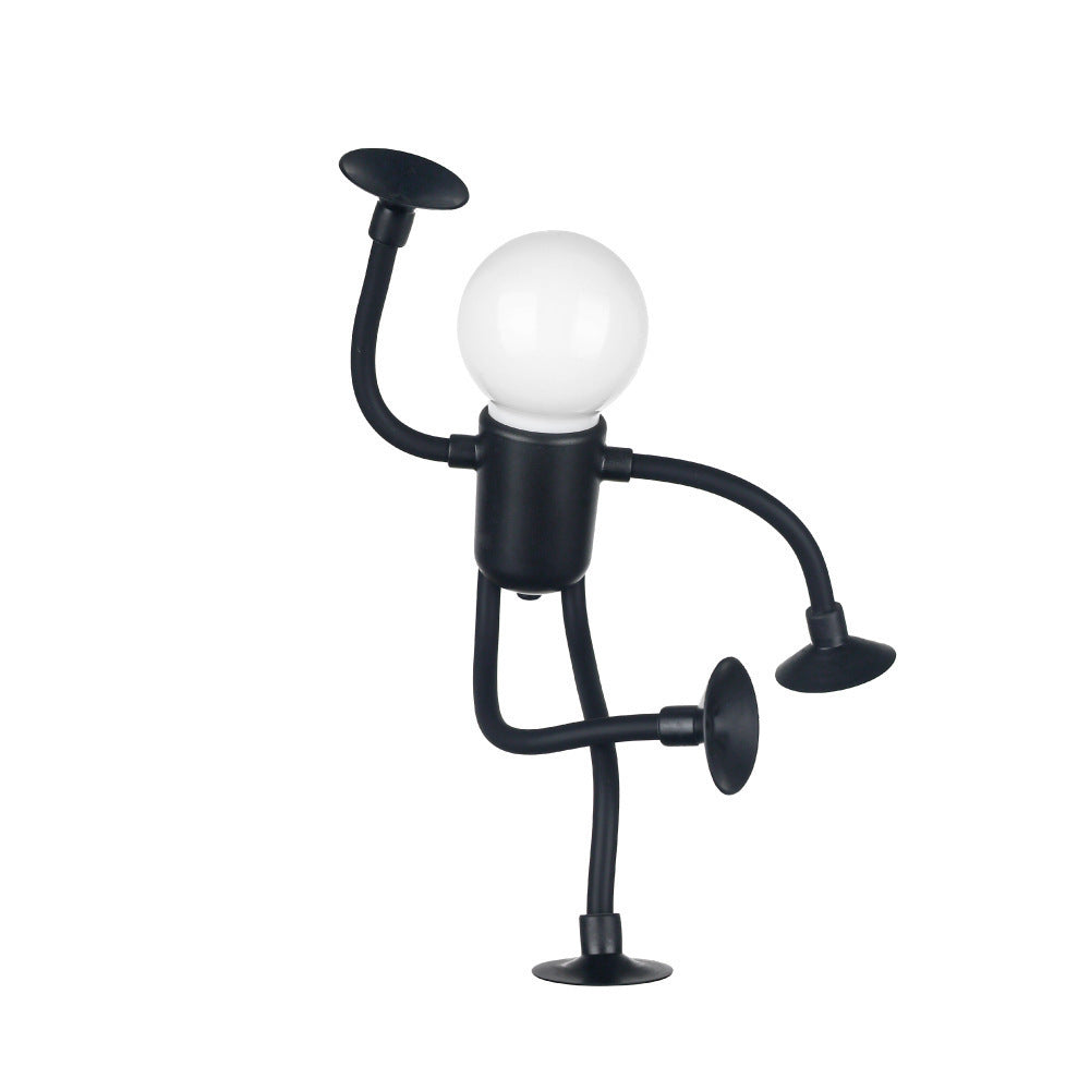 Lampe de bureau à lumière nocturne amusante et polyvalente, avec une forme changeante, un ornement créatif et un bouton original, fonctionnant sur batterie à succion.