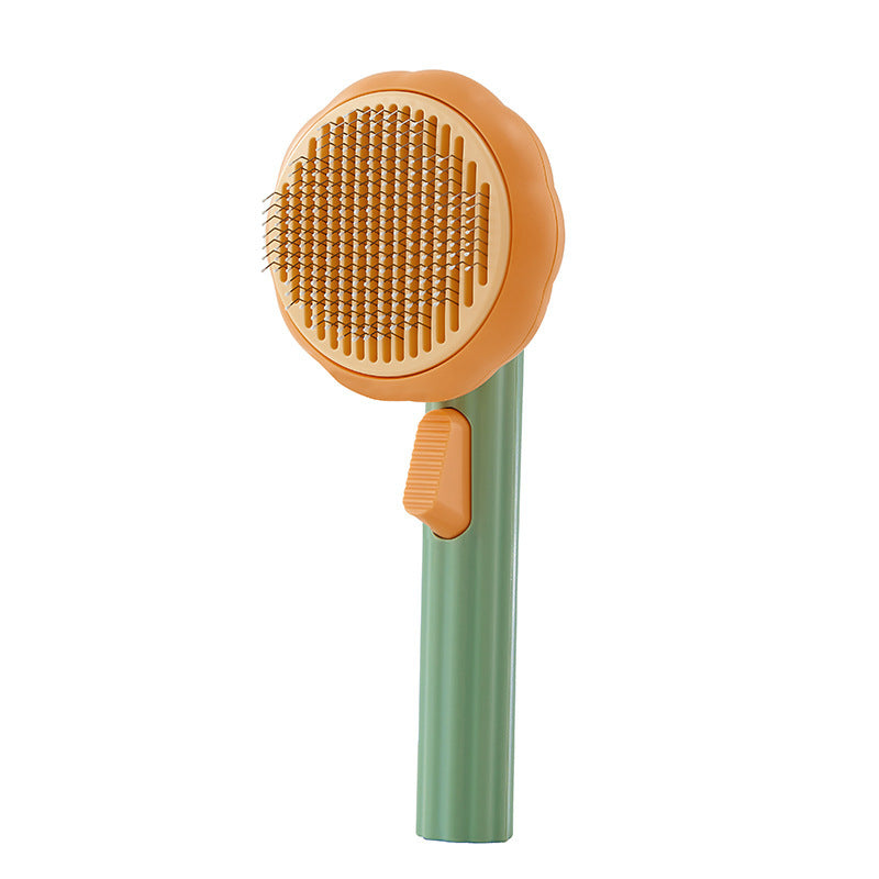 Nouvelle brosse pour chat domestique très demandée, peigne en acier à main avec système d'auto-nettoyage pour enlever les poils.