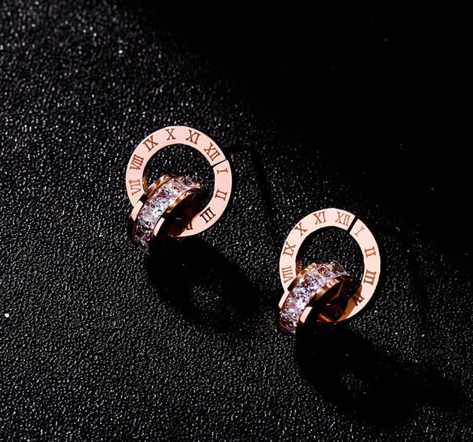 Boucles d'oreilles à double anneau en acier inoxydable couleur or rose. - Ivory Deals Market