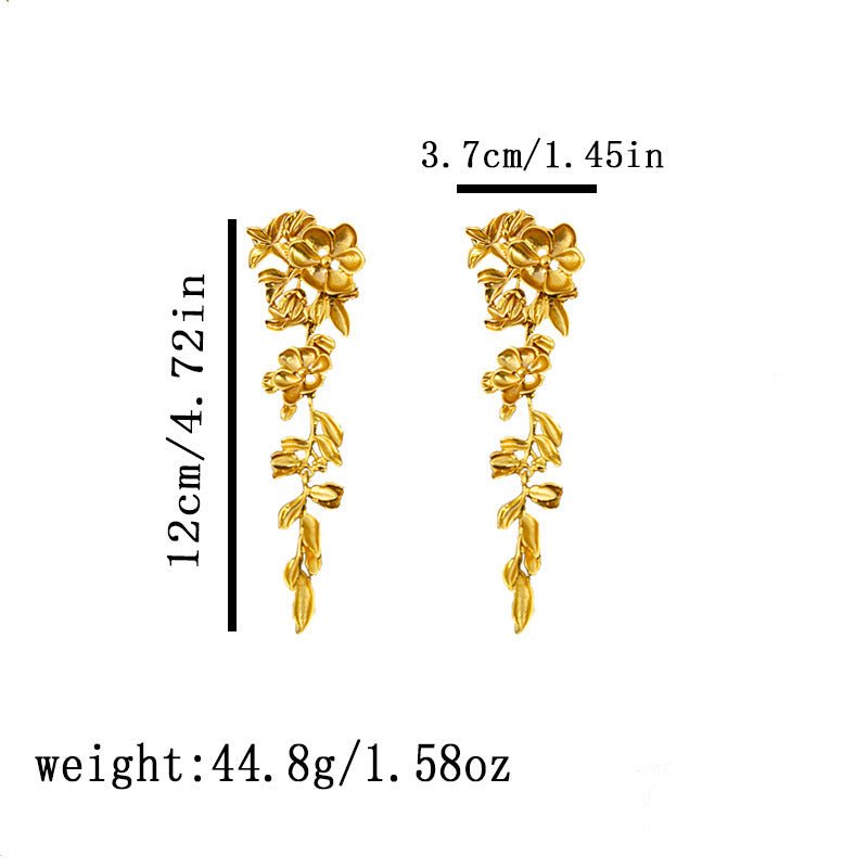 Boucles d'oreilles à pompons fleurs tridimensionnelles rétro pour femmes - Ivory Deals Market