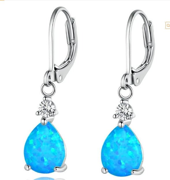 Boucles d'oreilles en opale blanche - Ivory Deals Market