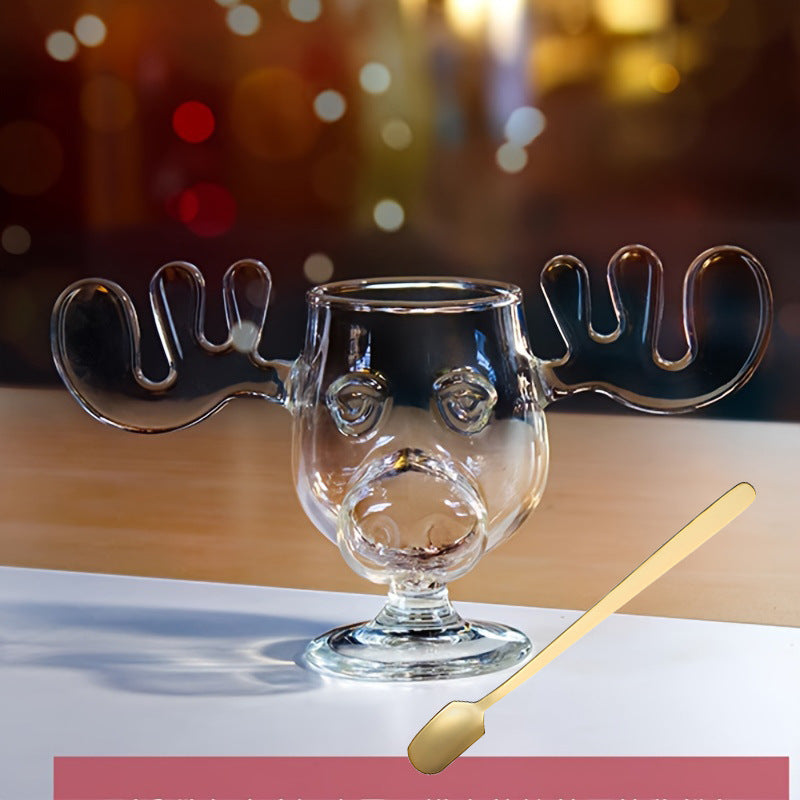 Tasse de Noël créative en verre avec élan, ustensiles de cuisine.