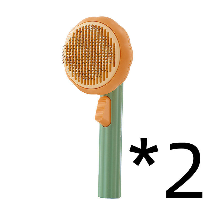 Nouvelle brosse pour chat domestique très demandée, peigne en acier à main avec système d'auto-nettoyage pour enlever les poils.