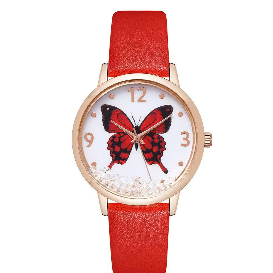 Montre à quartz avec papillon en strass pour femmes