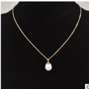 Collier pendentif en perle d'eau douce. - Ivory Deals Market