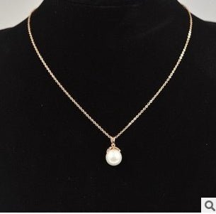 Collier pendentif en perle d'eau douce. - Ivory Deals Market