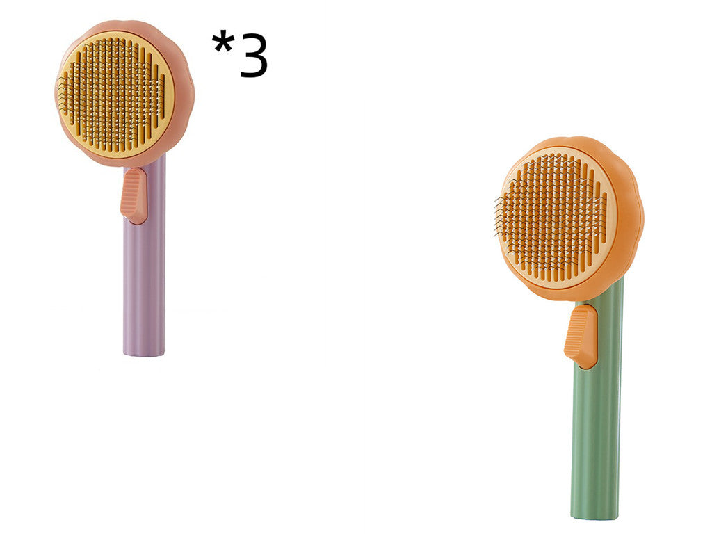 Nouvelle brosse pour chat domestique très demandée, peigne en acier à main avec système d'auto-nettoyage pour enlever les poils.