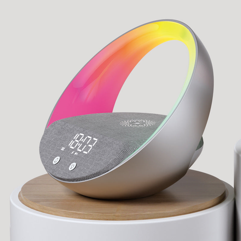 Réveil lumineux avec haut-parleur Bluetooth et chargeur sans fil multifonctionnel.