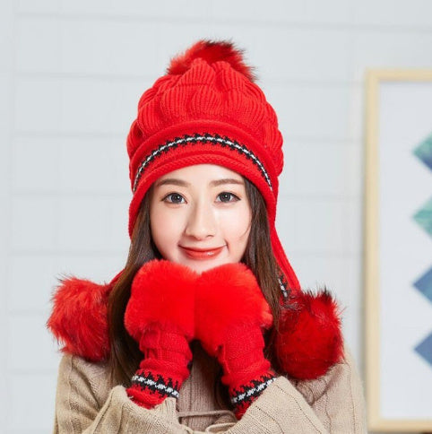 Bonnet d'hiver chaud en tricot douillet avec rabats d'oreilles et pompon, parfait pour le ski et les activités en plein air.