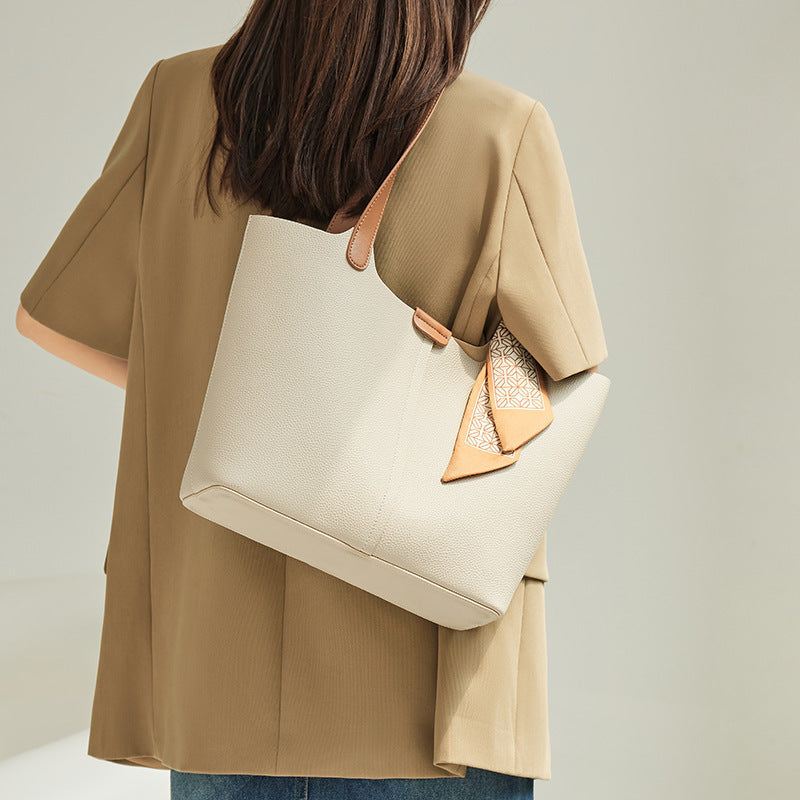 Sac à bandoulière en cuir véritable de grande capacité Commuter