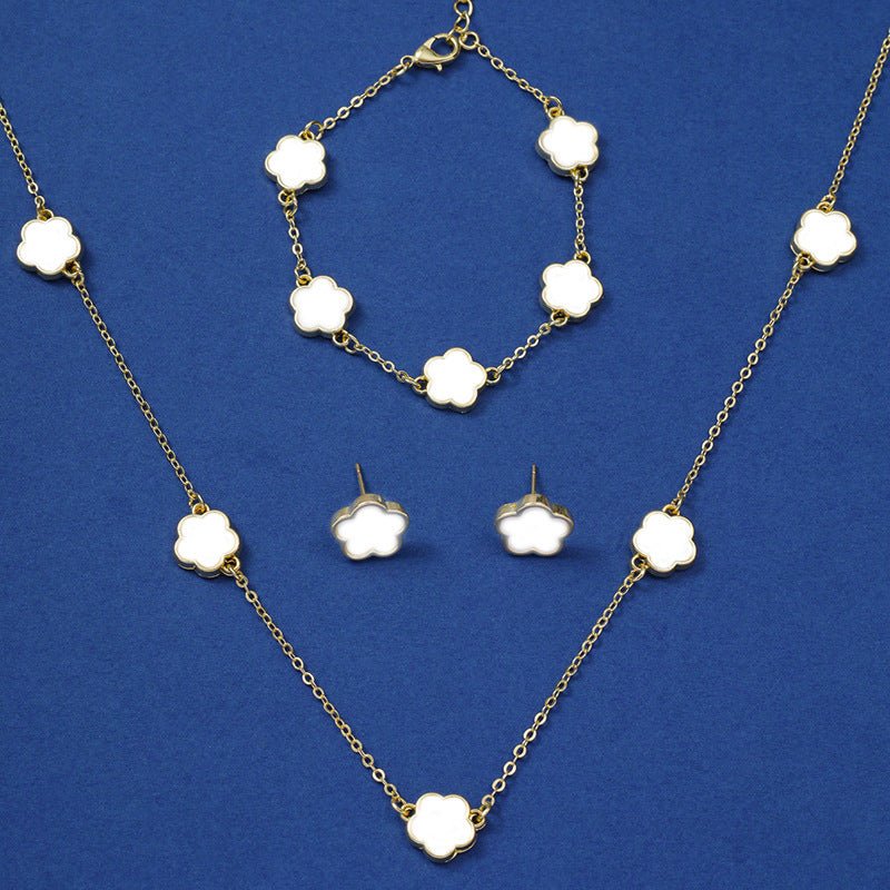 Ensemble de trois pièces de collier porte - bonheur à cinq pétales de fleur - Ivory Deals Market